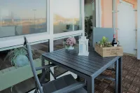 Beautiful apartment directly on the beach Living room and terrace with panoramic sea view