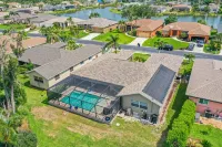 Beautiful updated home with new saltwater pool/lanai, and close to the beaches!