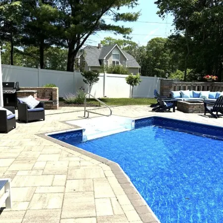 Modern coastal retreat w/ pool, close to beaches and golf courses.