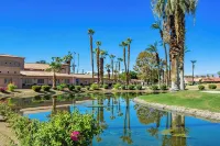 Charming 2-bedroom house with AC, in country club palms with a view of Golf C..