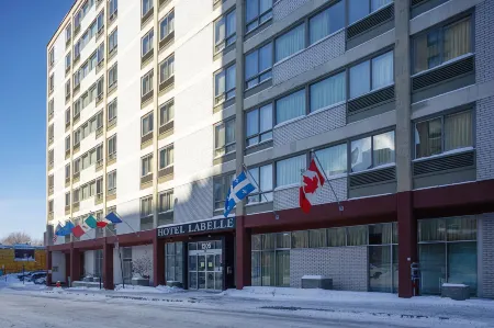 Hotel les Suites Labelle Отели рядом с достопримечательностью «Парк Жан-Драпо»