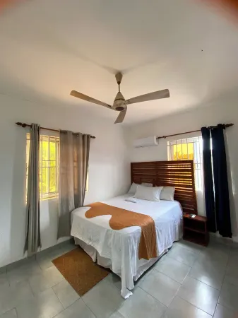 E-Town City Guest House Отели рядом с достопримечательностью «Сан-Жоржи-да-Мина»