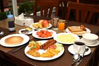 Hotel Osho Home - breakfast
