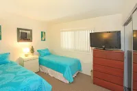 Spacious Living Area and Front Patio - Cozy Family Retreat