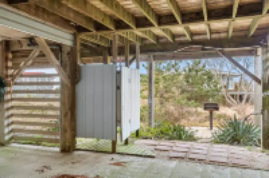 Charming Coastal Escape with Deck and Scenic Sunsets - Delightful Haven