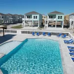 Community Pool and Outdoor Balcony - Charming Coastal Retreat Hotels in Rockport