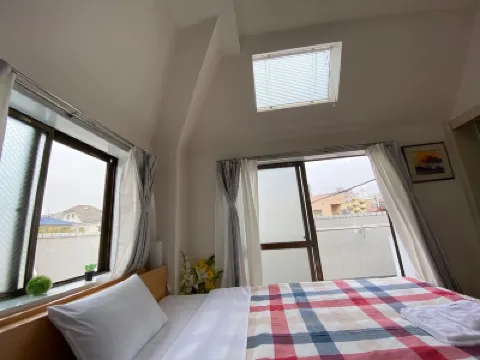 Quartier Blanc Yoga Hoteles cerca de Okamoto Park Minkaen