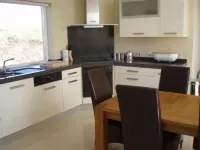 Luxurious Waterfront Holiday Homes with Private Pebble Beach & Free WiFi.