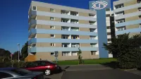 Vacation apartment with lake view, close to the beach with WiFi, dishwasher, microwave Hotels in Heiligenhafen