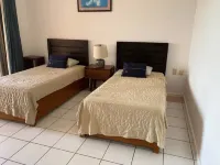 Beachfront Condo at Club de Yates 푸에르토아벤트라스 호텔