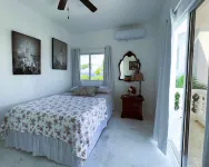 Room w/ ocean view balcony next to the beach. 2 pools, fire pit, gardens & more!