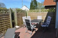 Holiday home in a quiet location in the center of Nordseebad Tossens Hotels in Tossens