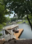 Stunning property with 2 docks, kayaks, SUP, firepit, hammock & huge water mat
