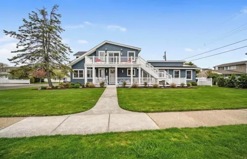 Unbeatable location - 4 houses to beach, 5BR, 3BA, walkability!