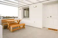 Santorini's Old Mill Serene Getaway by Pori Beach