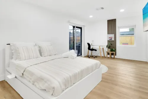 Sarasota escape awaits- a 4-bedroom, 2-bathroom home featuring a brand-new pool.