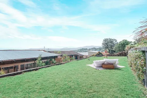 Retreat by the Sea – Coastal Escape with Cozy Spa & Panoramic Ocean Sunset Views