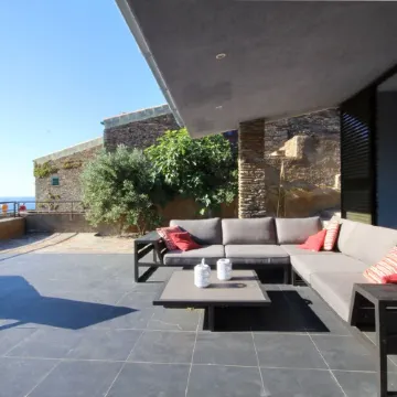 A charming family home with private pool in Cadaques with sea views.