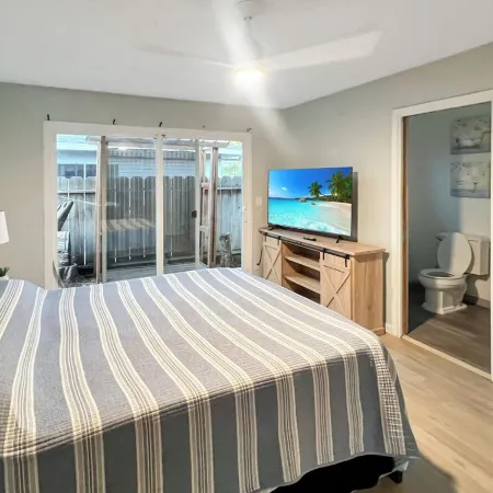 Beautiful Home in quiet neighborhood with a pool and close to stores & highways.