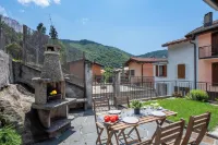 Casa Elvezia in Val Colla | Terrace + BBQ & Fireplace - Happy Rentals - บังกะโล