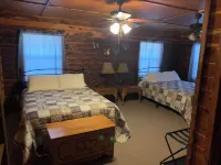 Beautiful Log Cabin. Sleeps 2-8. Reds Landing Boat Ramp .5 mi Away. A+ Fishing.