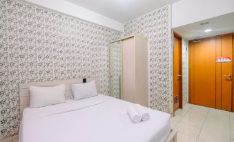 Fully Furnished with Comfortable Design Studio Apartment Margonda Residence 5 by Travelio