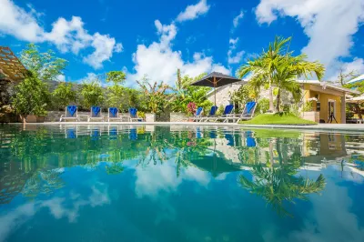 Kokomo Botanical Resort - Caribbean Family Cottages Hoteles cerca de Sunset Beach