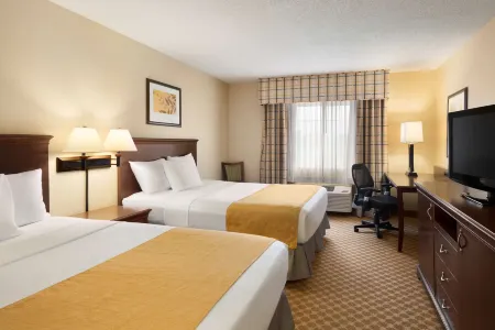 Country Inn & Suites by Radisson, Owatonna, MN Отели в г. Стил