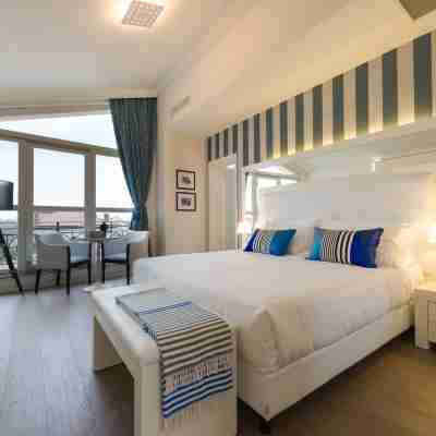 Palazzo Bezzi Hotel Rooms