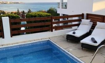 3 Bedrooms Villa with Sea View Private Pool and Enclosed Garden at Peyia 1 km Away from the Beach