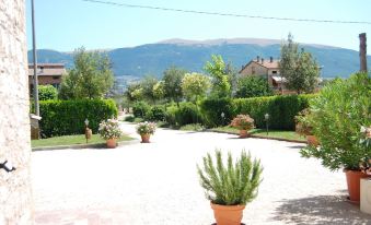 Agriturismo"Il Sagrato di Assisi" Appartamenti,Camere