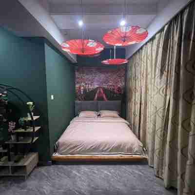 紫百合公寓民宿(賓水西道2號分店) Rooms