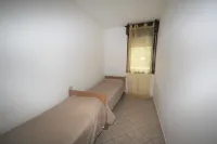 Accogliente trilocale a Rosolina con piscina in comune