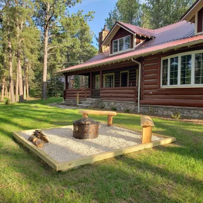 Two story authentic log construction home, built in 1936 with two fireplaces.