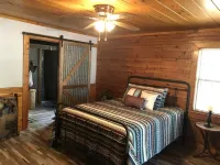 Lakefront rustic log cabin. Any season vacation, get away, or retreat.