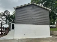 Lake home on Chickamauga Lake / Tennessee River.Driveway leads to boat ramp.