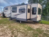 Private Rustic Creekside RV+15 Min Drive to Beach Fenced Parking Lot
