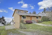 Pristine modern home with sweeping water views