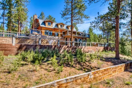 Spacious cabin in the woods w/ a private hot tub, deck, & fireplace  SUV  needed