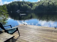 Waterfront camp on quiet part of Lake Winnisquam, dog-friendly, w/dock Hotels in Meredith