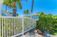 AMI Beach Front Condo - heated pool and less than 50 steps to the Beach!