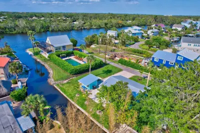 Charming cottage with views of the Imperial River Hotels near Barefoot beach Bonita Springs,FL