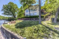 6100 sf, Beds for 32, Hot Tub, Theatre, Game Rm , Entertainers Dock, 310' Shore