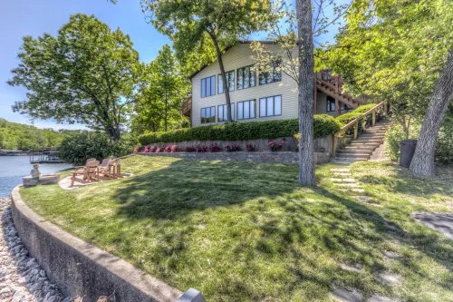 6100 sf, Beds for 32, Hot Tub, Theatre, Game Rm , Entertainers Dock, 310' Shore