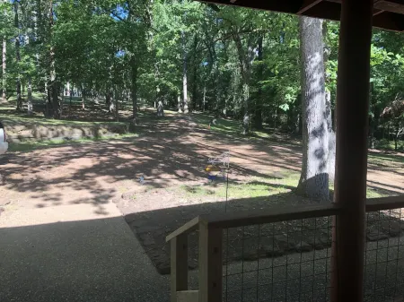 Lakefront rustic log cabin. Any season vacation, get away, or retreat.