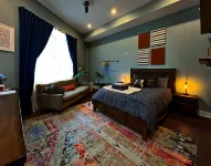Private Street Entrance to Spacious Guest Room