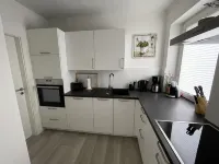 Mila vacation apartment with direct sea view and small sauna Hotels in Laboe