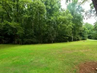 Vintage charm meets modern comfort in this historic 1850s cabin at Lake Hartwell Hotels in Gumlog