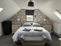 Quiet setting with secure gated parking, children's play area & farm animals