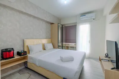 Sophisticated Studio Room at Podomoro Golf View Apartment by Travelio
